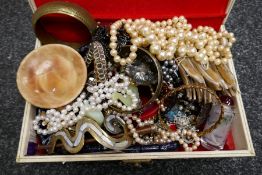 Vintage jewellery box containing various costume jewellery to incl. bangles, pearls, Oriental scent