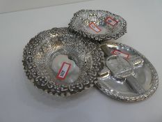 A selection of silver hallmarked trinket dishes with very ornate, pierced decoration and another fol