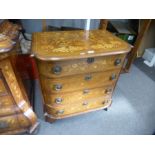 An antique Dutch marquetry bow fronted chest having 4 drawers