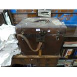 A chest containing vintage dolls and clothing, bags and vintage white jackets, etc