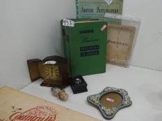 A Selection of vintage cook books, photography and a cased travelling clock