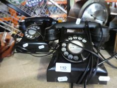 Two vintage black telephones