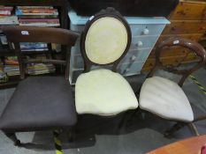 A cream chair with carved wood rose decoration, balloon back chair and another