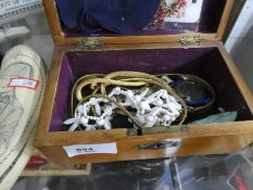 Two wooden boxes of costume jewellery, pens, etc