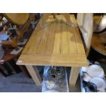 A pine rectangular Kitchen table