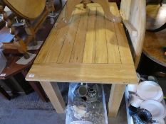 A pine rectangular Kitchen table