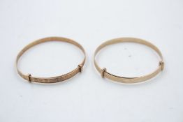 2 x 9ct Gold expandable bangles 2.1g