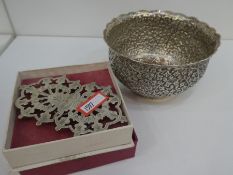 An Indian white metal bowl of floral design, weight approx 6.56ozt, as well as a white metal belt bu