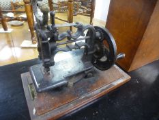 Sewing machine in a mahogany case