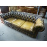 A pair of modern leather Chesterfield sofas by Thomas Lloyd, each 200cms