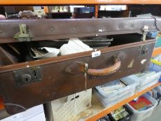 Leather bound suitcase containing various ephemera