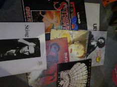 A box of LP records to include Meat Loaf, UB40, Sting, sound tracks, etc