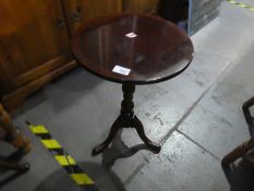 A drop leaf small table with drawer to front on casters and a small round occasional table