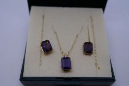 9ct yellow gold fine chain hung with a square amethyst pendant together with a pair matching earring