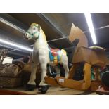 A Wooden rocking horse, vintage metal child rocking horse and wooden train