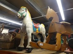 A Wooden rocking horse, vintage metal child rocking horse and wooden train