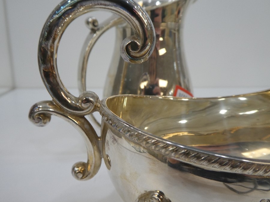 A high quality silver milk jug, heavy, hallmarked Sheffield 1937, Harrison Brothers and Hawson, with - Image 4 of 6