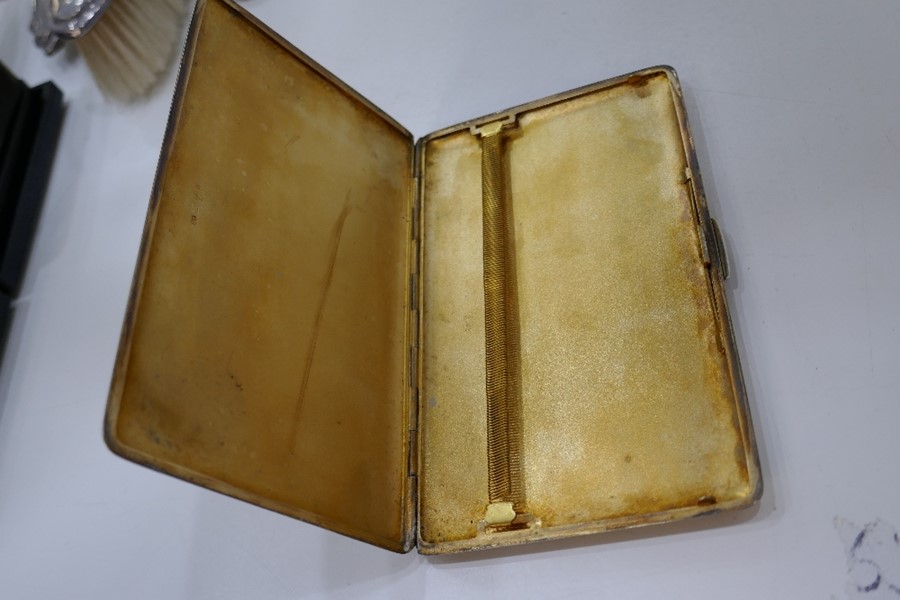 A large heavy silver cigarette case with gilt interior and engine turned exterior, Chester 1946, Don - Image 2 of 6