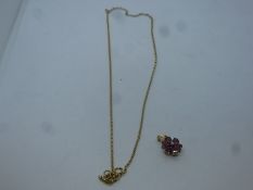 9ct yellow gold belcher chain, hung with a floral ruby pendant, marked 375, 3.8g