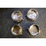 4 Silver salts, one silver gilt interior, on three feet, one having beaded rim, total weight 7.99ozt