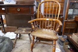 An antique child's Windsor armchair having Elm seat and a small country stool
