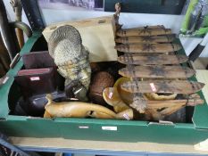 A box of treen to include book ends, figures, animals, musical instrument etc