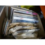 A Fidelity table top record player, a typewriter and a box of LPs