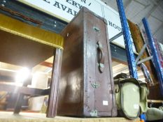 A large leather bound vintage suitcase