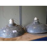 Two small industrial wall hanging lights