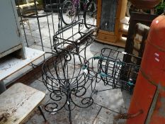 A selection of vintage wrought iron planters