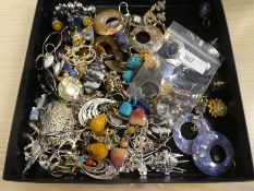 A tray of various earrings and rings to include silver hardstone and moonstone examples