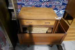 A selection of 70s style furniture to include drop leaf sewing table, blanket box on feet and 2 beds