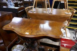 A Victorian Burr Walnut Serpentine card table, having quadrapod base, 91cm