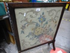 A wooden framed tapestry fire screen, stool, etc