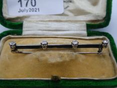 18ct white gold bar brooch set with 4 diamonds, marked 18ct in fitted case, approx 5cm