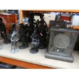 A large selection of tribal figures metal ethnic figures from around the World and a brass clock