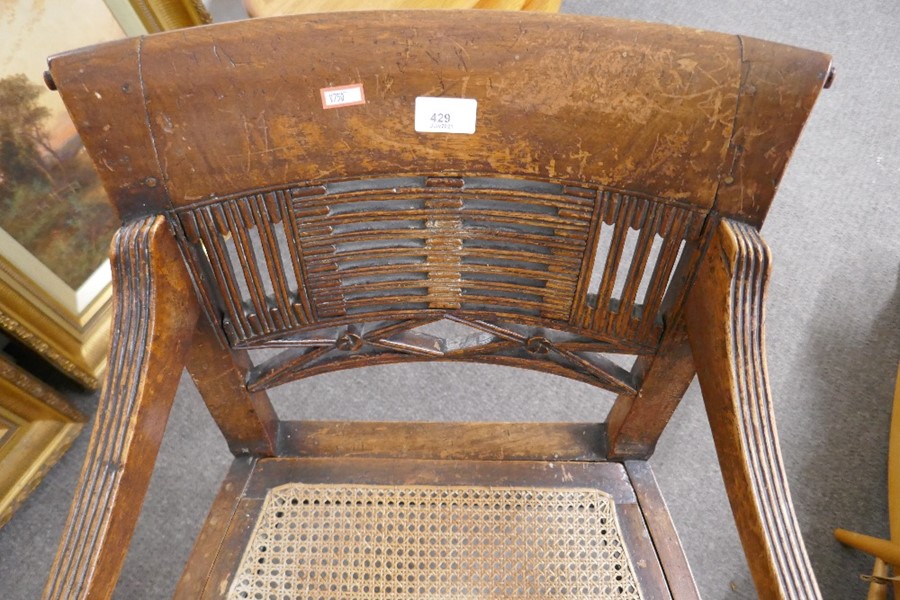 A Regency mahogany open armchair having cane seat on fluted front legs - Image 4 of 4