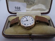 Vintage 9ct yellow gold 'Rolex' wristwatch on tan leather strap AF, glass, case marked 375, in fitte