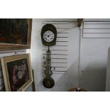 An old French farmhouse clock having embossed brass decoration