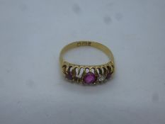 18ct yellow gold ring inset with rubies, diameter, AF one diamond missing, 2.6g approx, size M