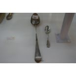 One large Georgian silver serving spoons AF and a smaller Georgian silver spoon late 18th century, 3