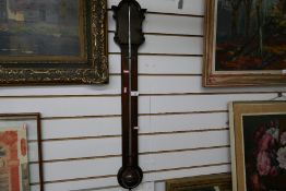 An antique mahogany stick barometer by Edward Hardy 1772