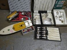 A box of mixed collectables, including vintage stationery sets, rules, silver plated items