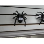 Four black spiders