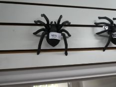 Four black spiders