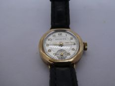 Vintage 9ct 'Invicta' wristwatch on black leather strap