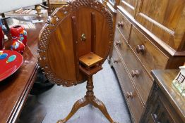 Reproduction mahogany tripod table having pierced border, 76cm