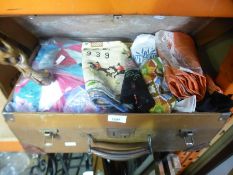 A case of vintage tapestries, linen, etc