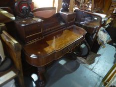 A Victorian mahogany Duchess dressing table, with oval mirror