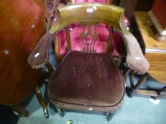 A reproduction fireside armchair and a desk chair (2)